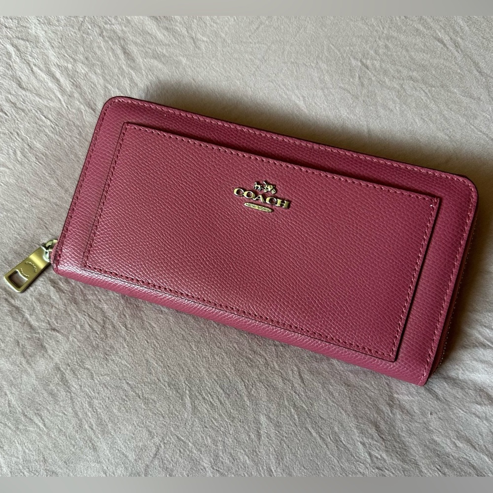 Gorgeous never used Coach pebble leather accordion zip wallet, Raspberry pink.